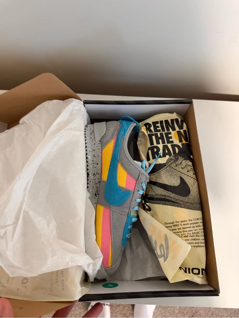 Nike Women's Gray Sneakers with Blue, Pink & Yellow Accents